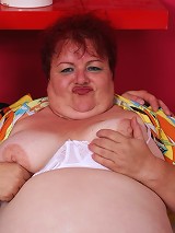 Chunky redhead Margaret flashes her big boobs and attracts a handsome guy with a revved up meat