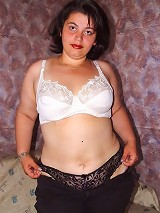 Shy Chubby Brunette Stripping and Posing